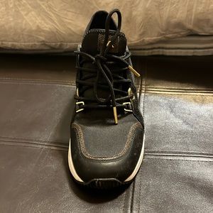 Michael Kors wedge dressy sneakers. Size 8.5 Worn approx. 5x.
